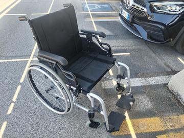 Carrozzina sedia a rotelle disabili