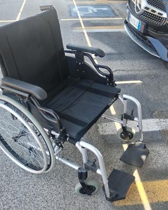 Carrozzina sedia a rotelle disabili