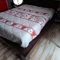 Letto matrimoniale bordato