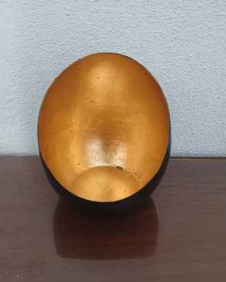 porta candele color oro e nero
