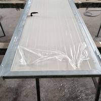 Porta a battente coibentata in pannello Sandwich 