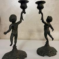 Coppia di candelabri di bronzo