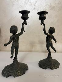 Coppia di candelabri di bronzo
