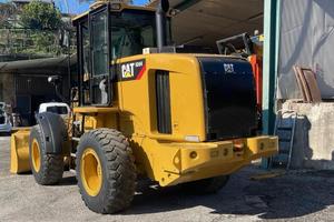 Pala gommata CAT 924H + benna impastatrice 800 l