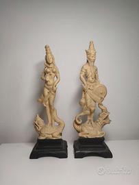 Coppia statuine orientali in resina
