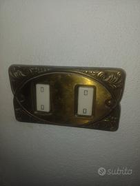 placche interrutori ottone