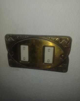 placche interrutori ottone