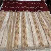 Tenda bordeaux e oro