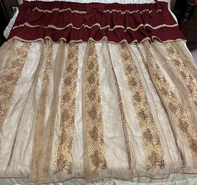 Tenda bordeaux e oro