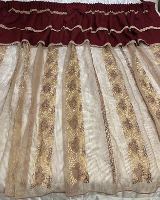 Tenda bordeaux e oro