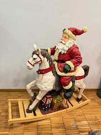 Grande Babbo Natale a cavallo a dondolo