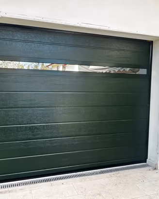 Portone basculante sezionale garage