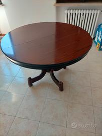 Tavolo rotondo allungabile. 