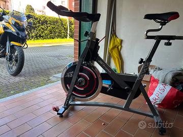 Bici da spinning e scarpe apposite
