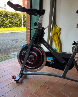 Bici da spinning e scarpe apposite
