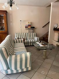 Coppia di divani in tessuto