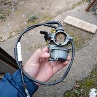 2 carburatori e un manubrio per pitbike