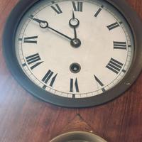 Orologio a pendolo in legno