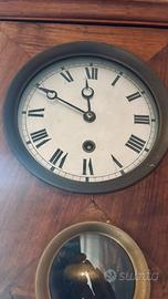 Orologio a pendolo in legno