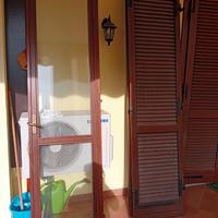 gelosie e porte a vetri