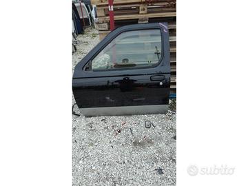 NISSAN NAVARA PORTE ANT E POST 2001