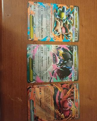 3 carte da collezione pokemon mega ex .