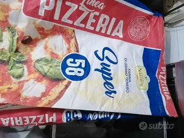 pizza romana sottile stesura al mattarello 
