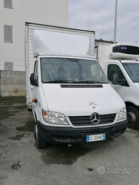 Veicolo Elettrofittato con mezza sponda