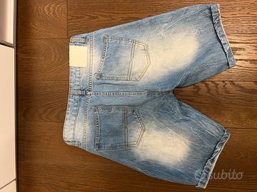 Jeans corti strappati buono stato