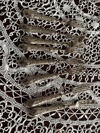 8 forchettine color argento