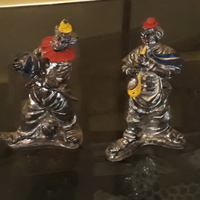 Statuette clown in resina argentata decorata