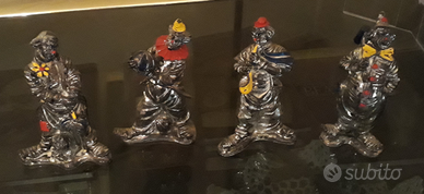 Statuette clown in resina argentata decorata