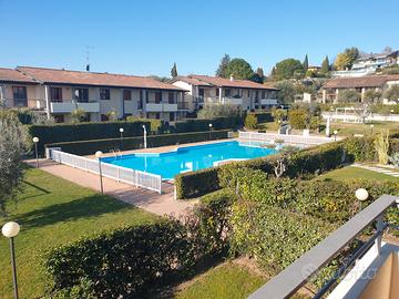 Apartamento con piscina davanti alla spiaggia