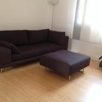 Divano con pouf abbinato