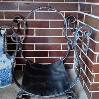 Porta legna in ferro battuto per camino