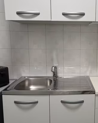 Cucina bianca Scolapiatti Lavello Fontana