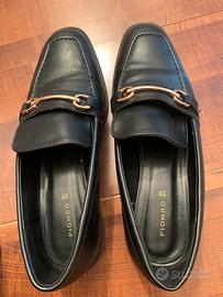 Scarpe nere con morsetto marca PIOMBO