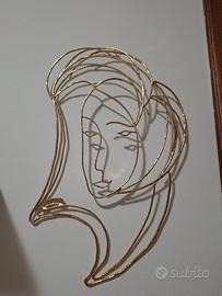 scultura a parete acciaio rivestita oro