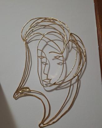 scultura a parete acciaio rivestita oro