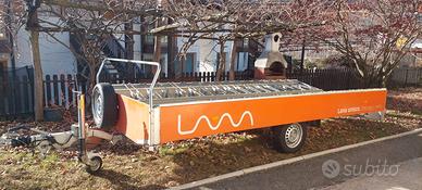 Rimorchio per biciclette