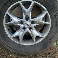  cerchi completi di gomme e bulloni