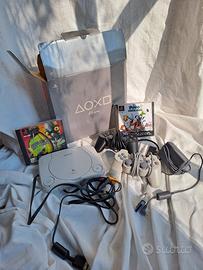 Playstation ONE con joysticks e cd giochi