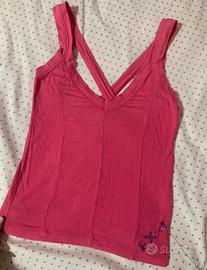 Top Ex-J particolare rosa con scollatura dietro