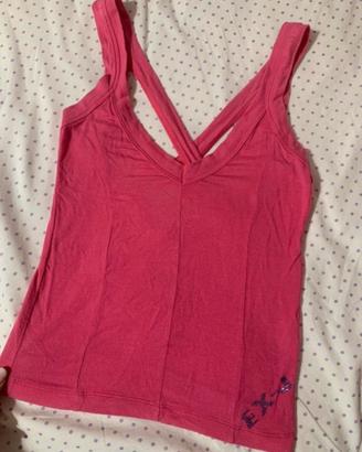 Top Ex-J particolare rosa con scollatura dietro
