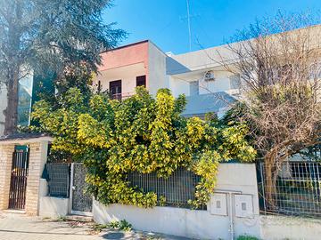 Villa a Schiera con Box Auto e Giardino