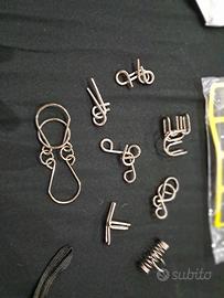 8 Pezzi Gioco di Puzzle Test di Logica ia acciaio 