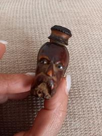 pipa antica con faccia in legno