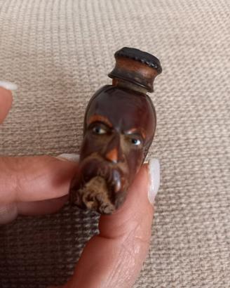 pipa antica con faccia in legno