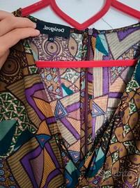 Tuta desigual taglia XS