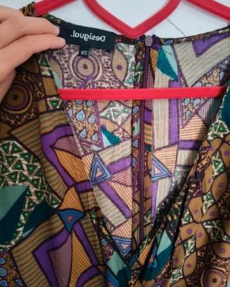 Tuta desigual taglia XS